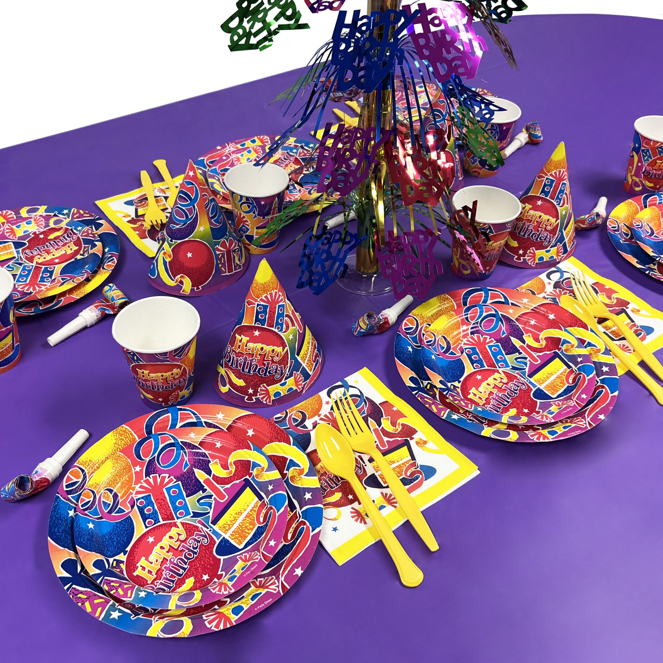 Solid-color tableware set on a purple table roll
